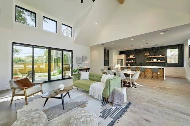 Vaulted great room with clerestory windows opening onto the kitchen