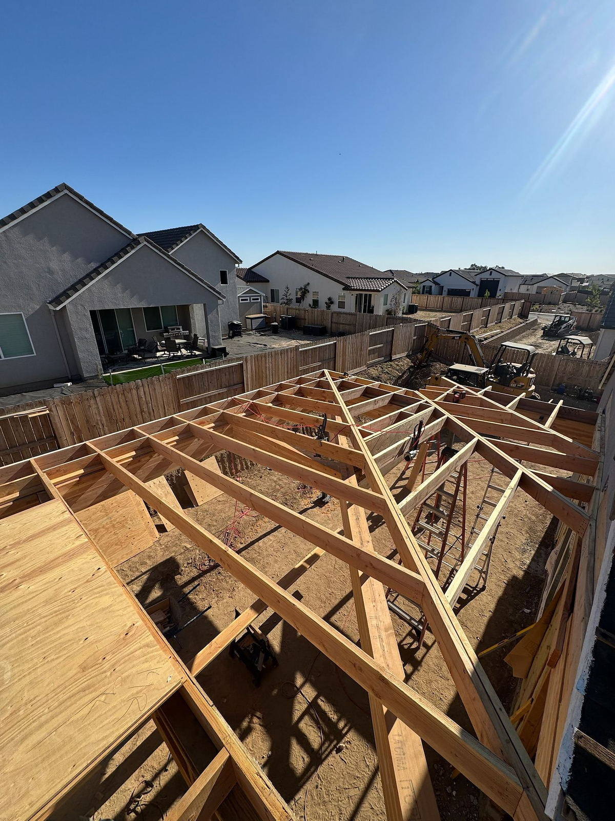 Overhead view of roof framing during a Lane Built roof set